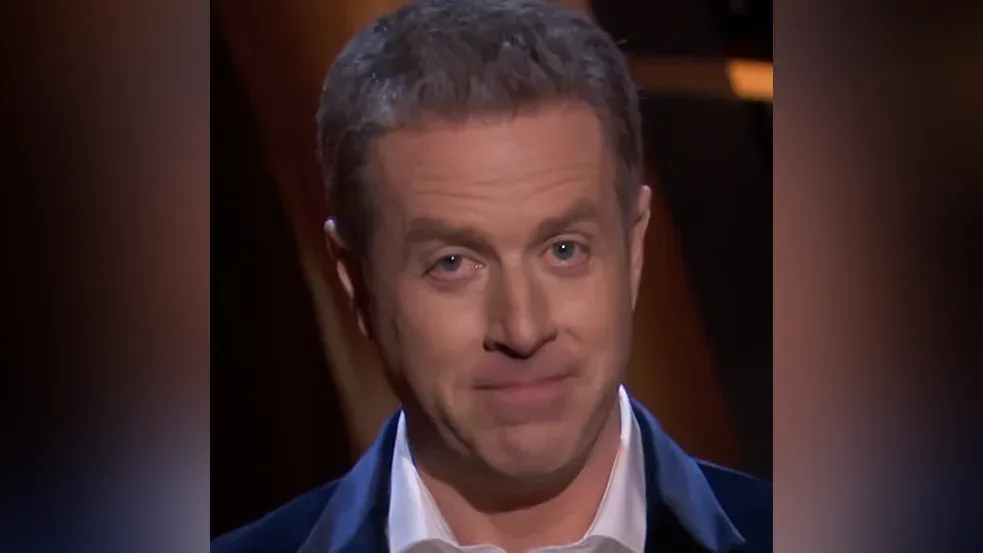A photo of a broken man with tears in his eyes