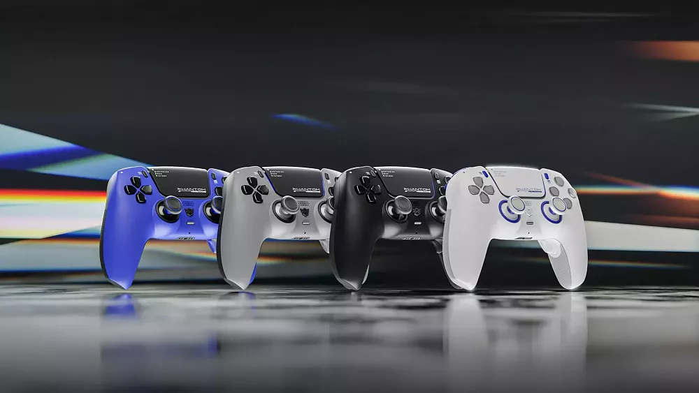 Four differently colored PlayStation 5 controllers lined up.