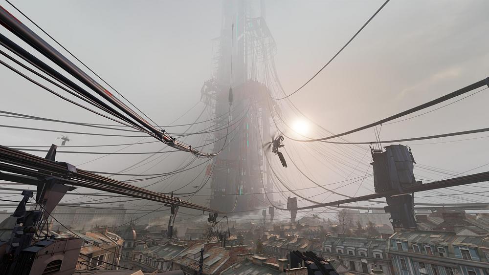 An extremely tall "citadel" like tower in the middle of a European city, long cables extend from the tower to far stretches of the city.