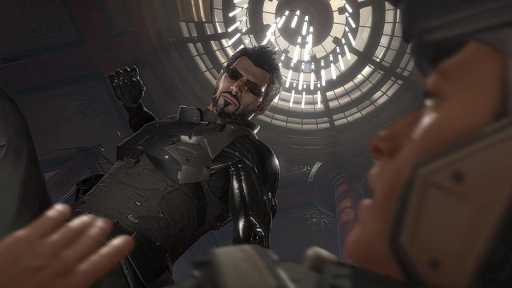Adam Jensen punching an enemy.
