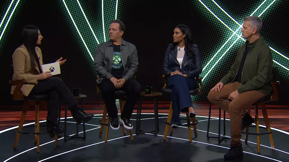 Phil Spencer, Sarah Bond, and Matt Booty on set of the Official Xbox Podcast