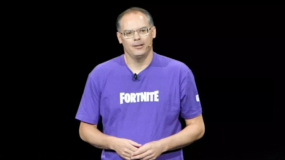 Epic Games CEO Tim Sweeney wearing a Fortnite shirt.