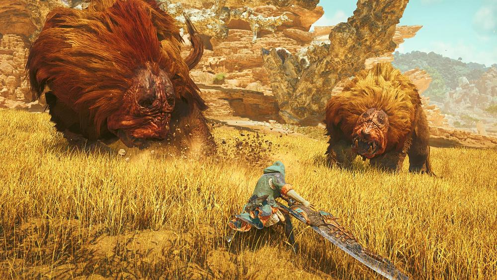 A person with a giant sword weapon about to attack two giant, 4-legged, hairy monsters.