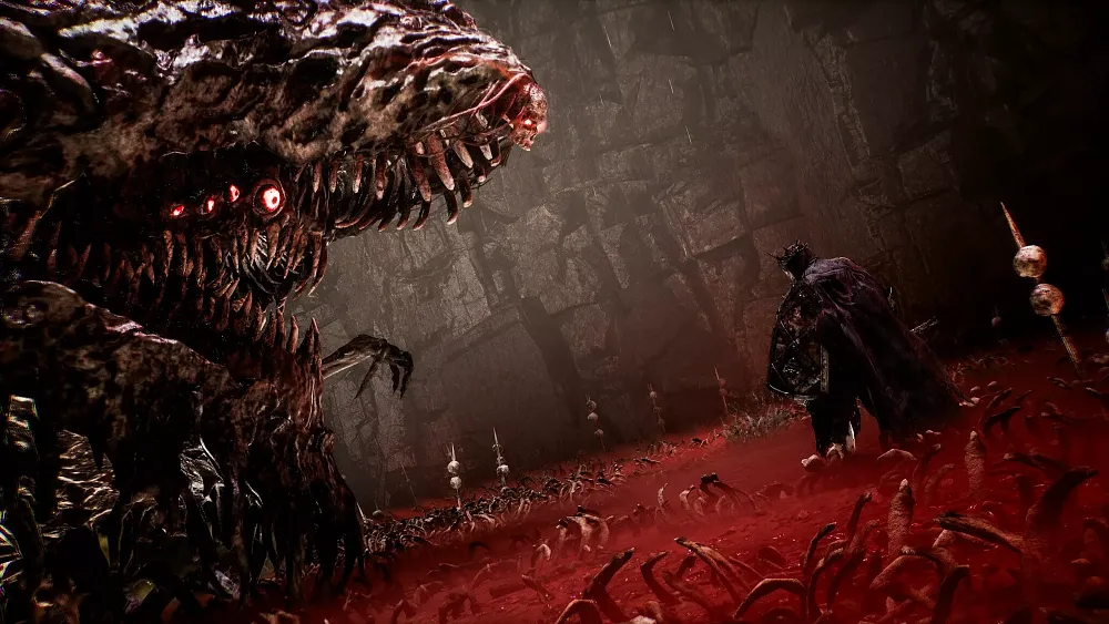 An armored and armed knight prepares to take on a giant creature that has many many rows of sharp teeth, all taking place in an arena with blood red ground and skulls on spikes.