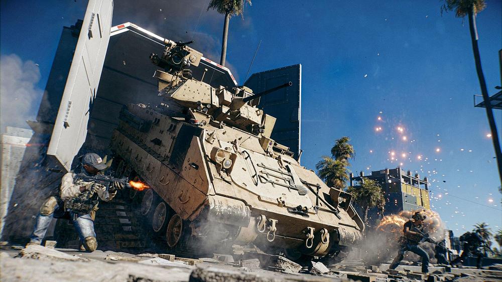 An armored vehicle dropping out of the back of a storage container into the middle of an active battlefield.