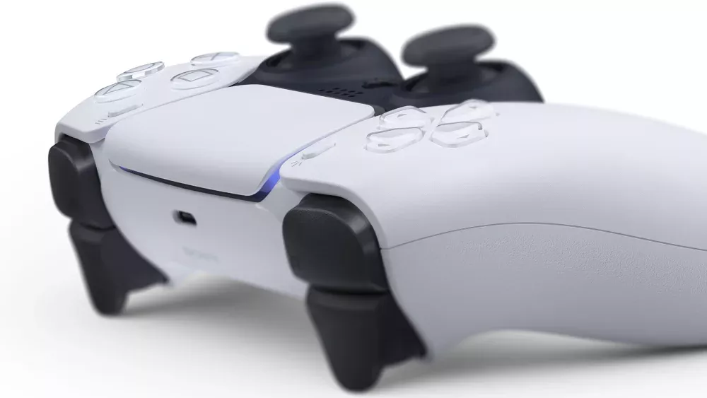 The PlayStation 5 DualSense controller, showing the front left angle of the device.