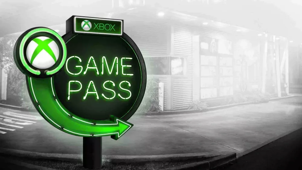 The Xbox Game Pass logo in a scene of a foggy street near a building.