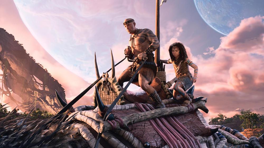 A CG version of actor Vin Diesel riding atop a dinosaur on an alien planet.