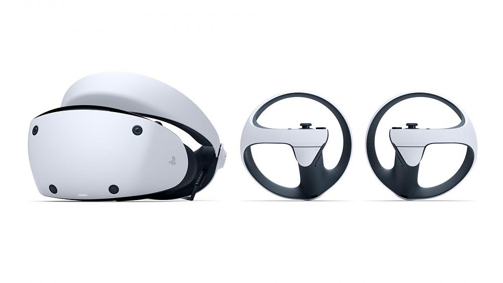 A white VR headset and two VR controllers from Sony.