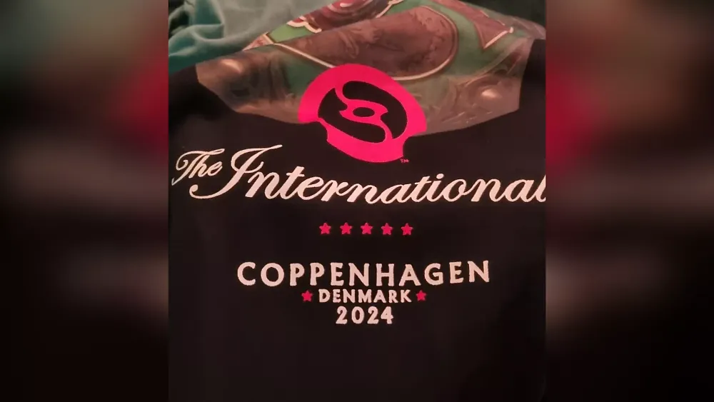 Photo of official merchandise for the DotA 2 esports tournament The International in which the city name is spelled incorrectly. It added an extra p to Copenhagen.