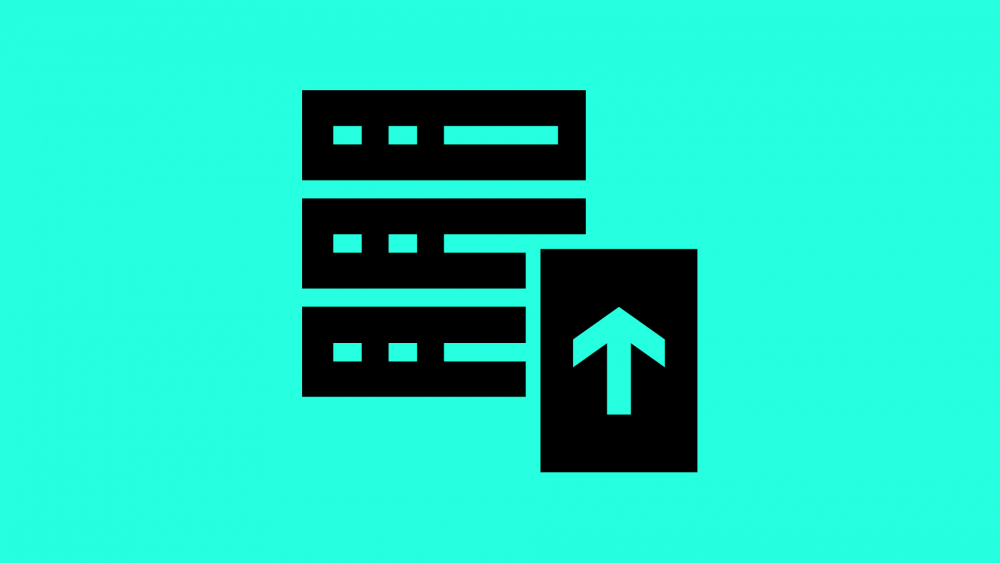 Image of black blocky symbols on a light blue background. One symbol is an upward pointing arrow.