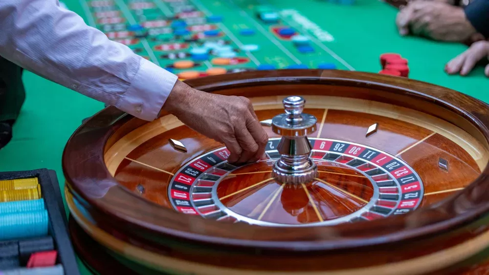 Photo of a roulette wheel by Leo_Visions on Unsplash