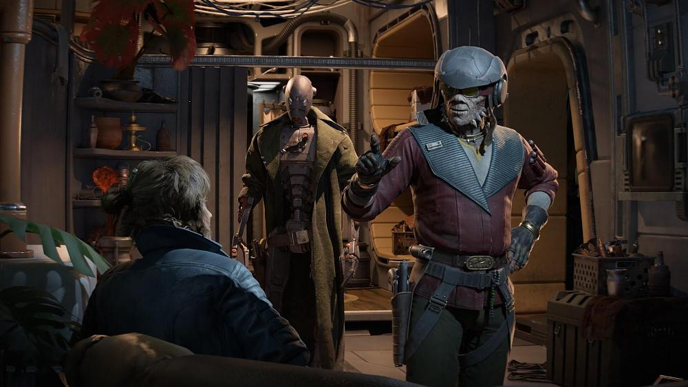 Screenshot from the Pirate's Fortune expansion for Star Wars Outlaws showing the main character, her robot crewmate, and an alien humanoid in space gear.