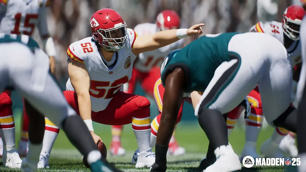 Screenshot from Madden 25 showing two American football teams at the line of scrimmage before the ball is snapped.