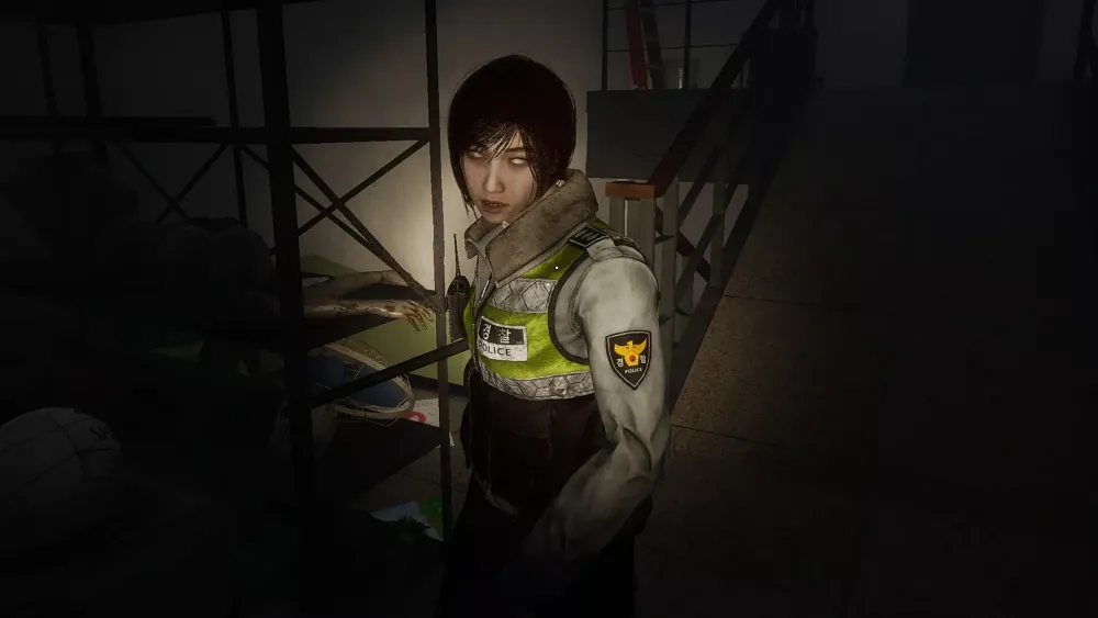 A security guard that looks to be turning into a zombie.