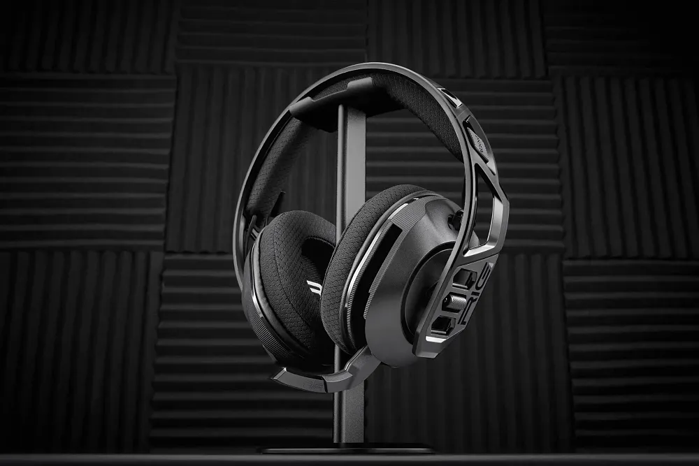 A gaming headset on a stand with its mic extended out