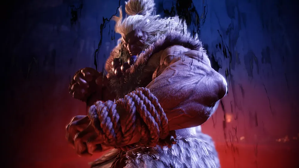 The fighter is striking a pose and bathed in red lighting.