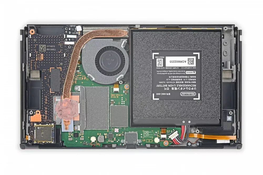 The internal components for a Nintendo Switch OLED from ifixit.