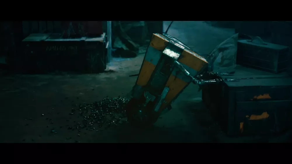 A robot crapping out a stream of bullets onto the floor.