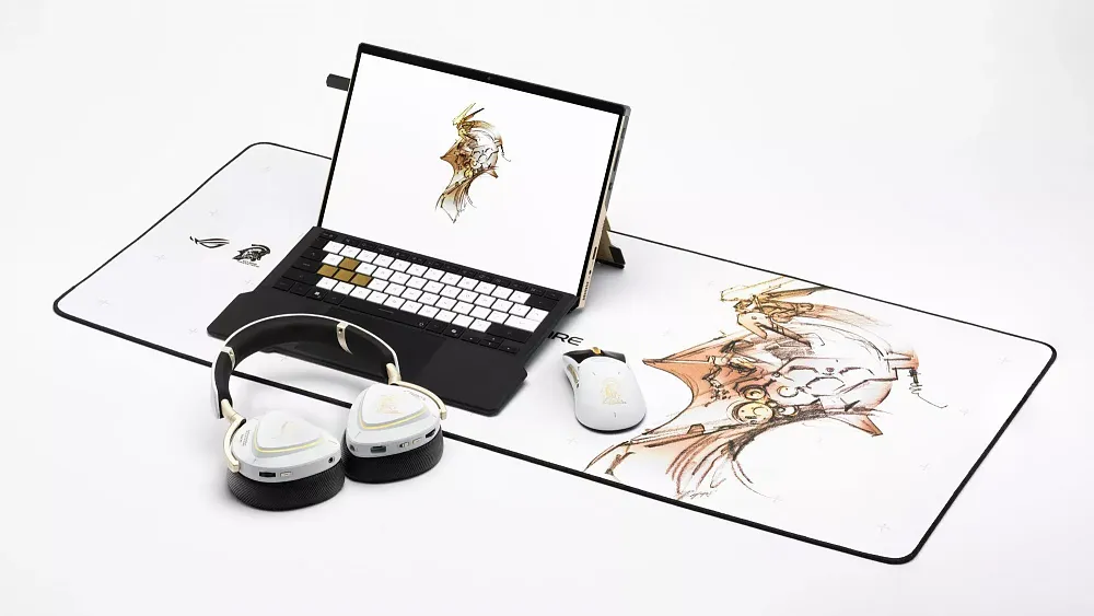 Photograph of Asus ROG gear branded with the Kojima Productions Ludens logo with a white, black, and gold design.