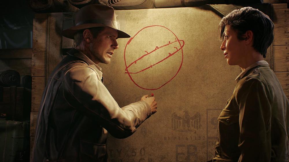 Indiana Jones and a lady in front of a board where they seem to be discussing and examining something to do with a great circle.