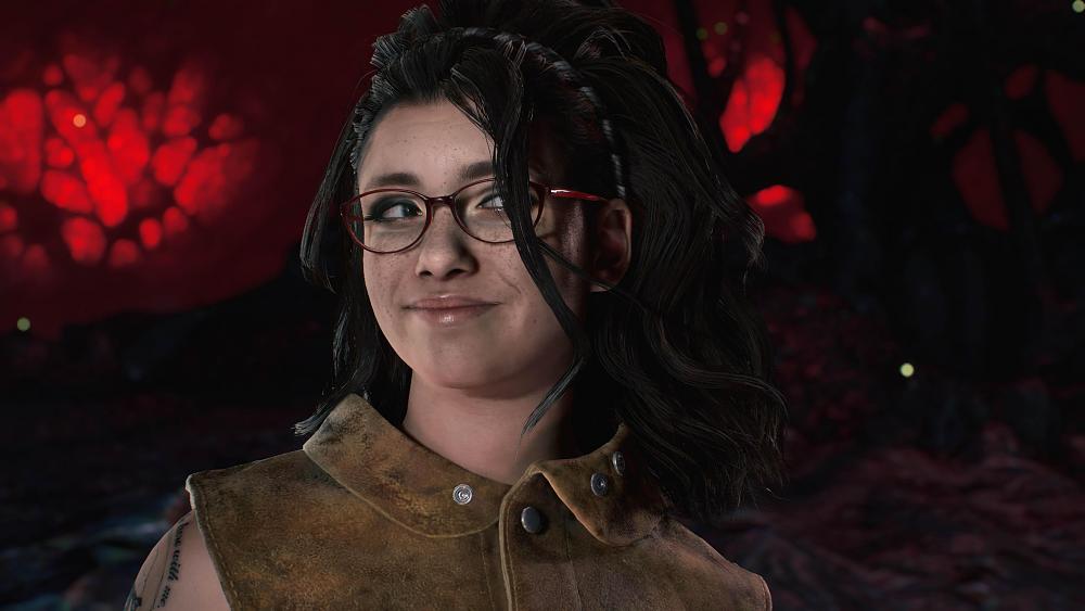 Headshot of Nico, one of the main NPC characters from Devil May Cry 5 with a smirk on her face.