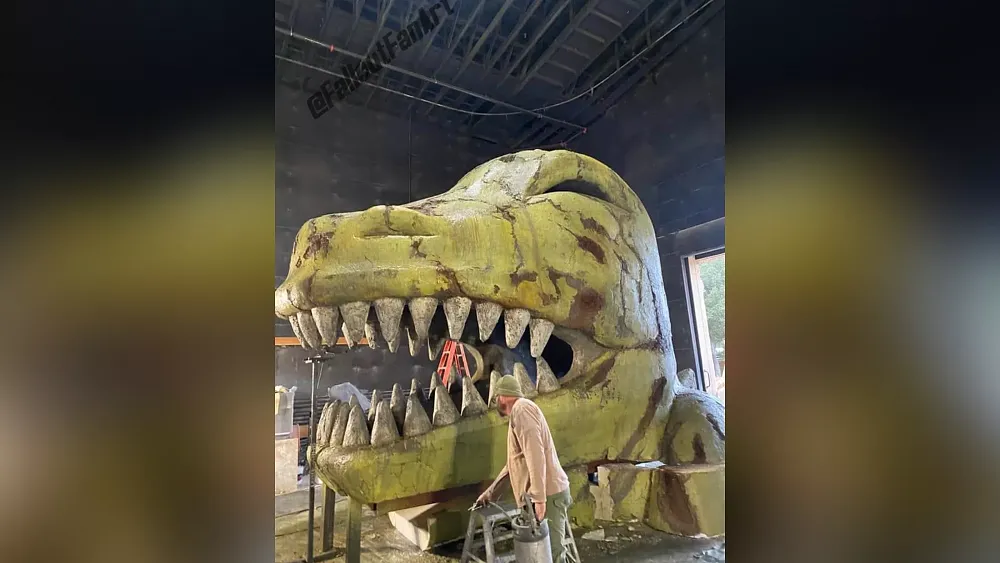 An aged and war torn T-rex head from the set of the Fallout TV show for season 2. This T-rex head resembles the head of Dinky the Dinosaur from the game Fallout: New Vegas.