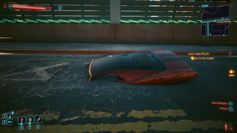 A car glitched into the road in Cyberpunk 2077.