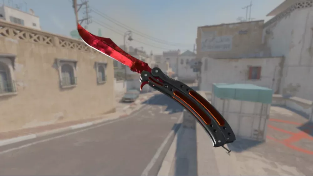 A StatTrak Factory New Doppler Ruby Butterfly Knife from Counter-Strike 2.