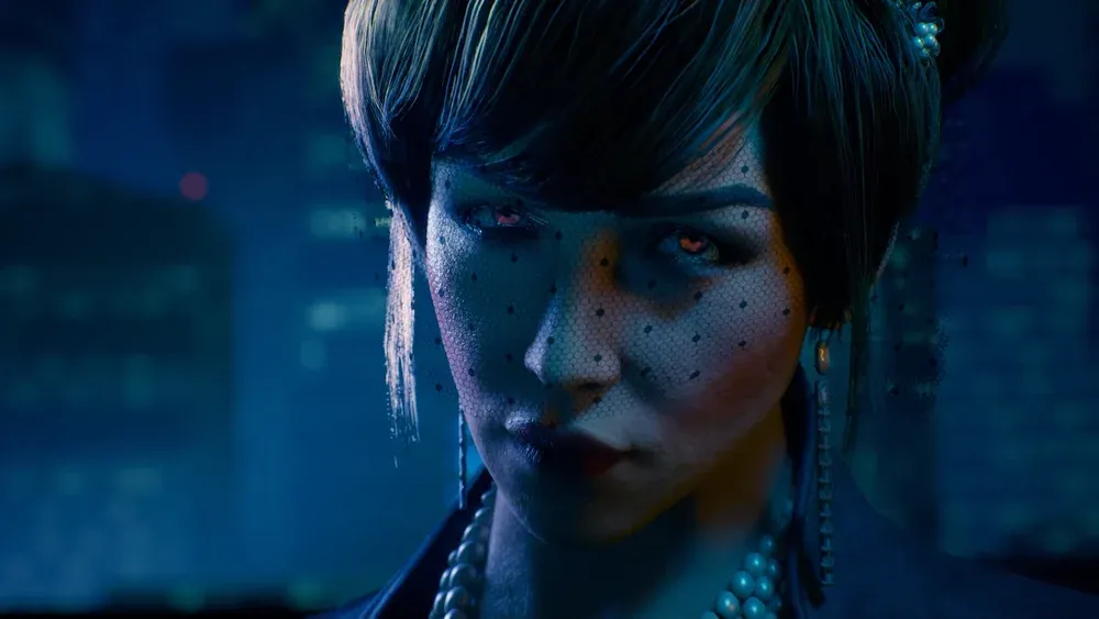 A closeup of a woman's face. She has glowing eyes.