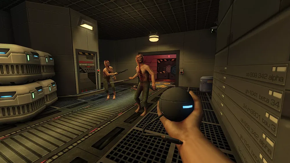 An extended hand holding a cyber ball thing. In front are two mutated looking humans, all standing in some sort of a sci-fi style room with metal walls and floors.