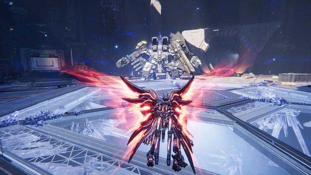 A giant mech with wings faces off against a larger, bulkier mech.