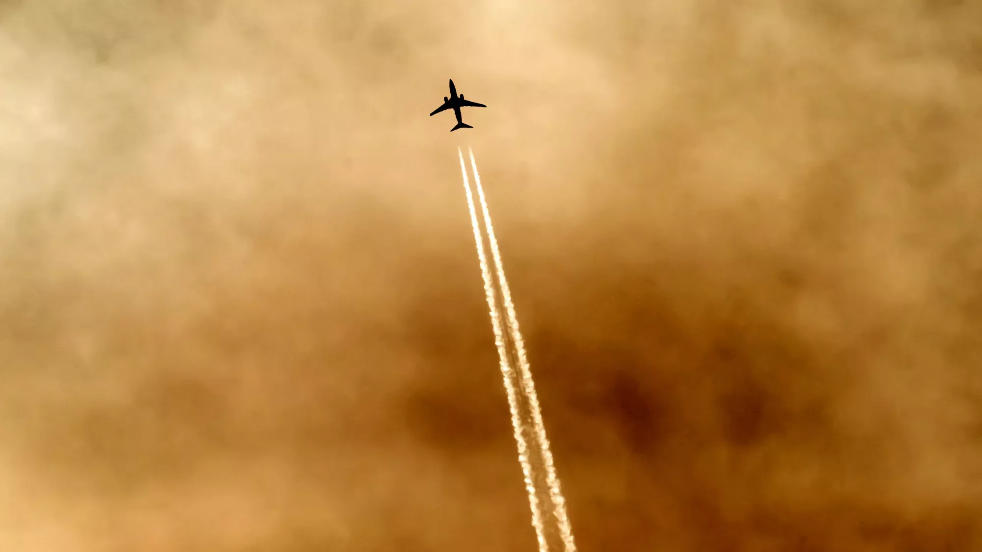 A jet airplane flying in the sky. Image from pexels.com.