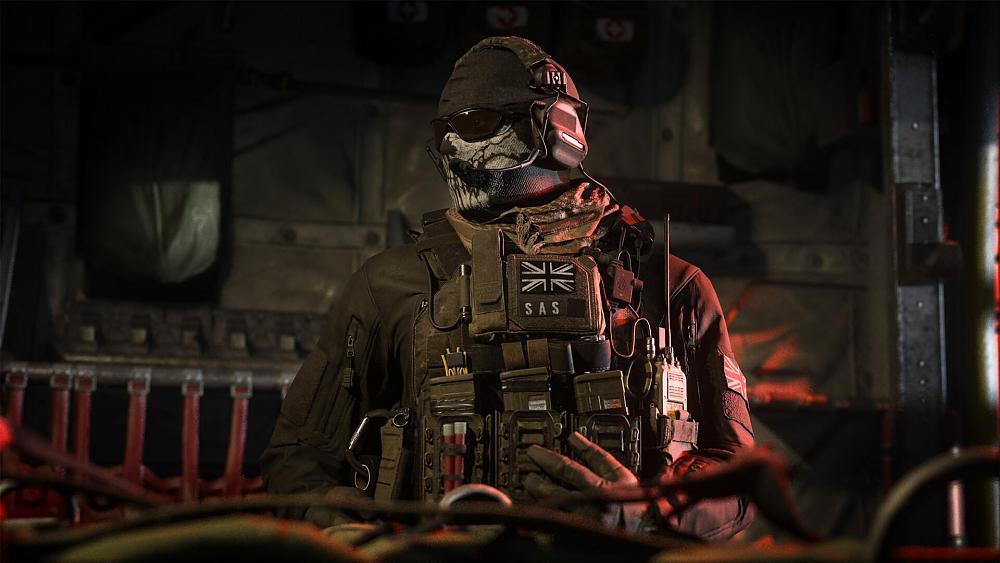 A soldier waiting to deploy in a cargo plane.