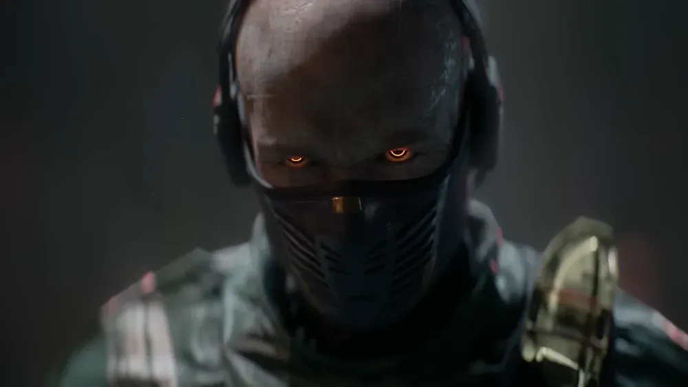 A closeup of a zombie-like man with glowing orange eyes.