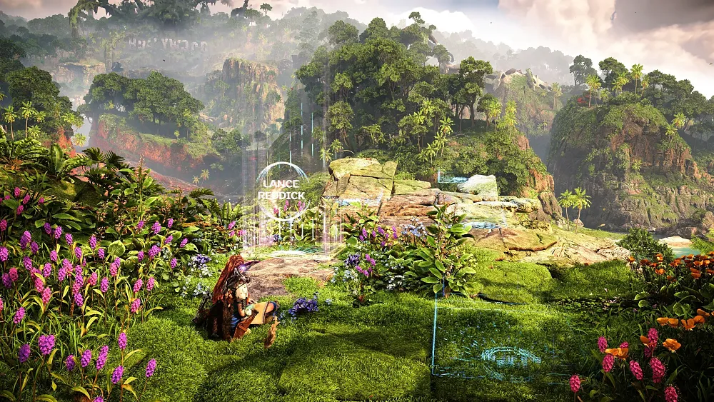 A screenshot from the Burning Shores expansion for Horizon Forbidden West showing a small in-game memorial for the late actor Lance Reddick.