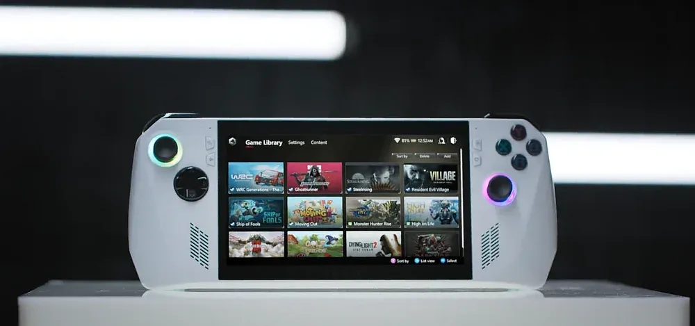A white handheld PC gaming device sitting on a white stand.