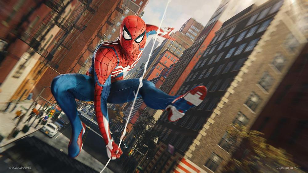 Spider-Man swinging through the streets of New York City.