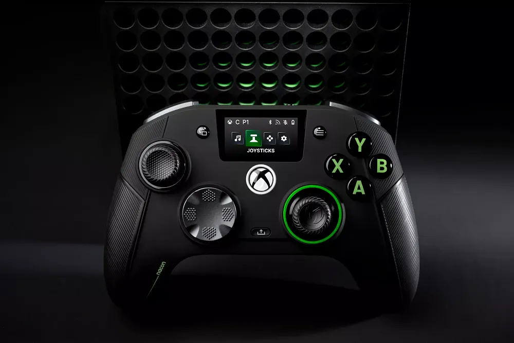 An Xbox controller with special d-pad and an LCD screen in the center.