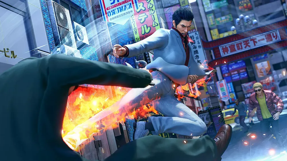 Kazuma Kiryu doing a flying kick against an enemy.