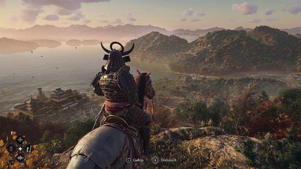 Screenshot showing a samurai, Yasuke, on a horse, overlooking a valley full of trees and hills and a Japanese village.