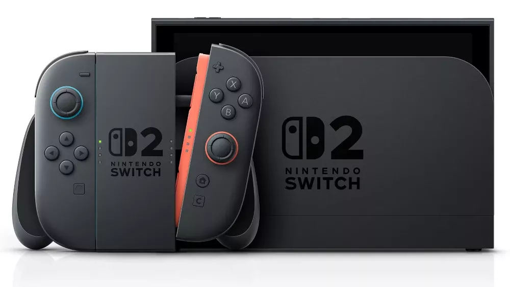 The Nintendo Switch 2 with the main unit sitting in the Switch 2 dock and the Joy-Con 2 controllers connected to a controller shell in front.