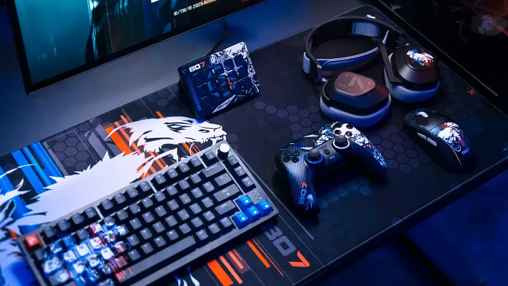 Various gaming peripherals like a keyboard, controller, Elgato Stream Deck, and headphones all with Call of Duty: Black Ops 7 color schemes and designs.
