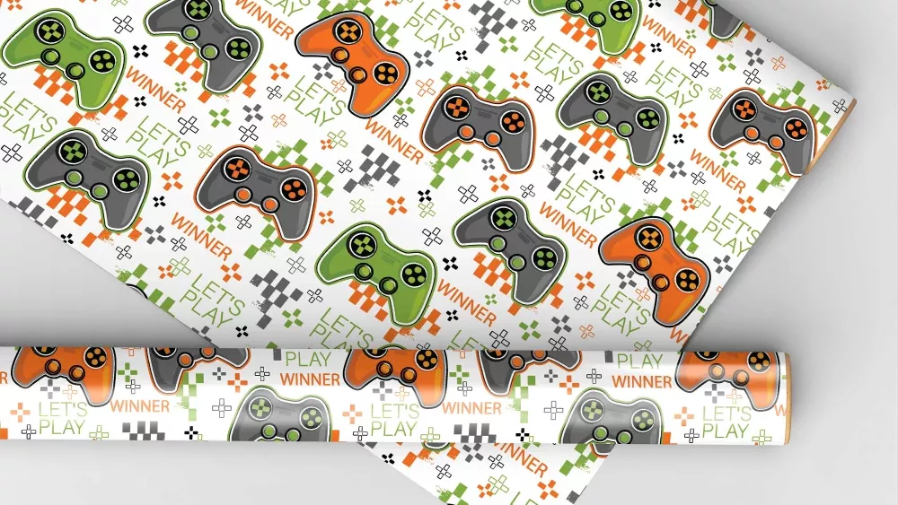 Gift wrapping paper with game controllers for the design.