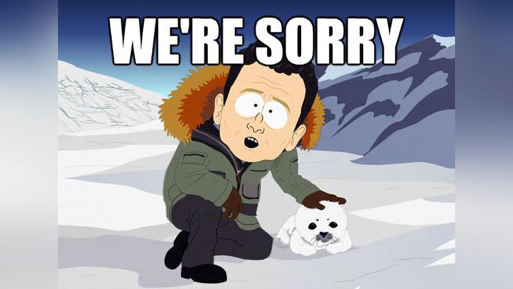 Cartoon man petting a seal saying "We're sorry"