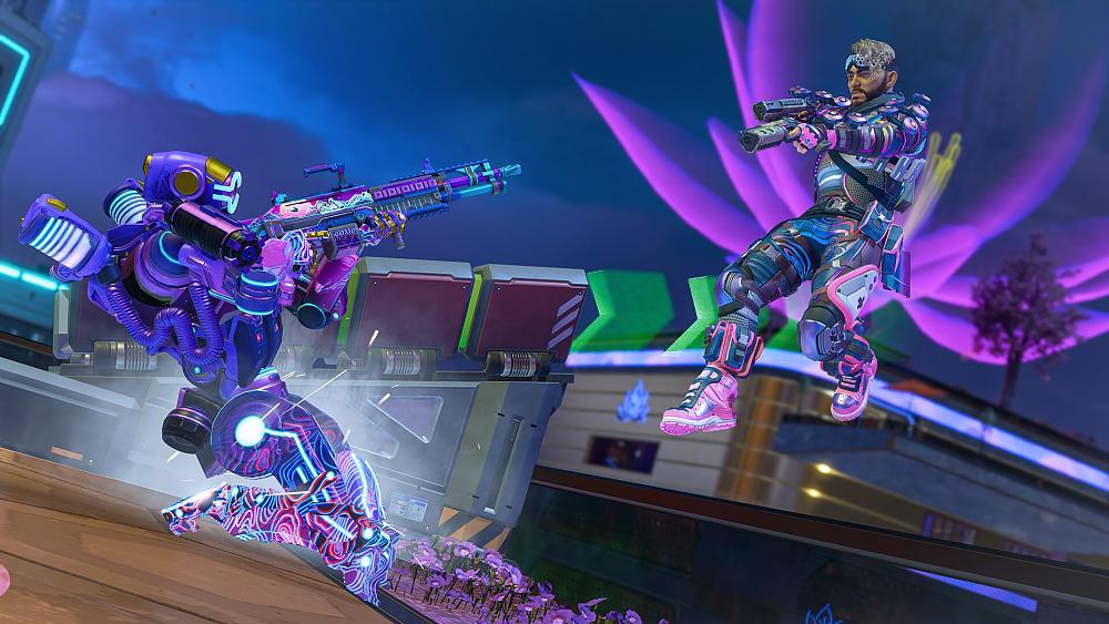 A sliding purple robot is aiming a weapon at a jumping man who is aiming back at the robot while jumping in the air.