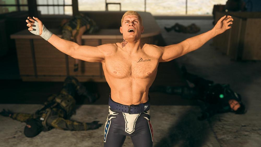A man with arms raised up and apparently yelling into the air.