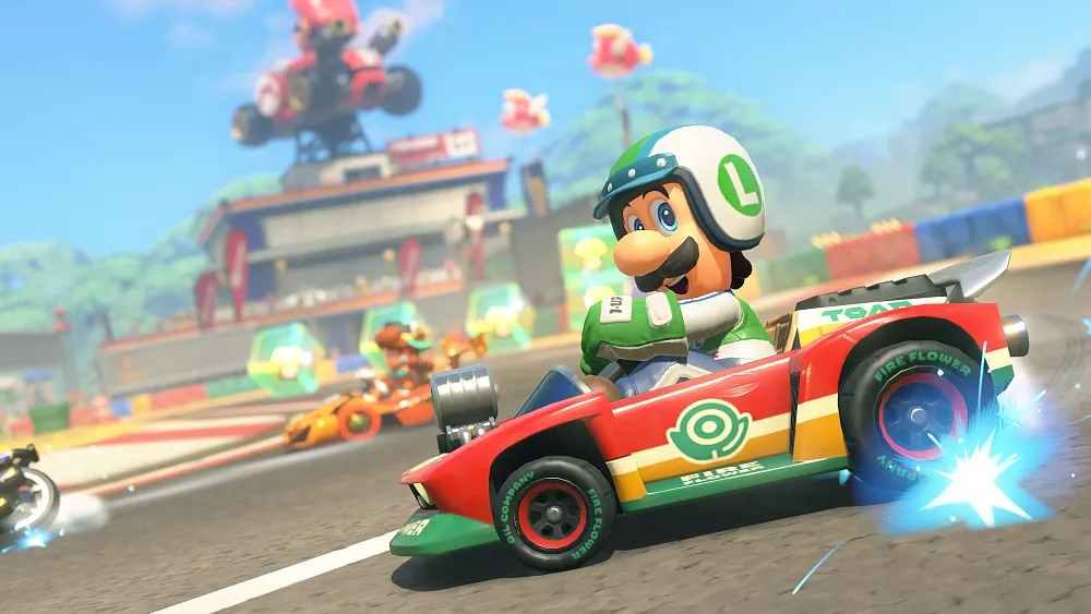 Luigi power sliding on by in a kart from Mario Kart World, a Switch 2 game.