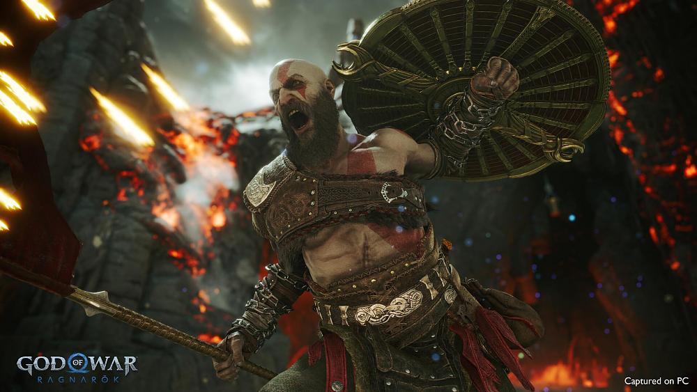 A very angry, old, bald, bearded spartan with a spear and shield in the middle of an attack.