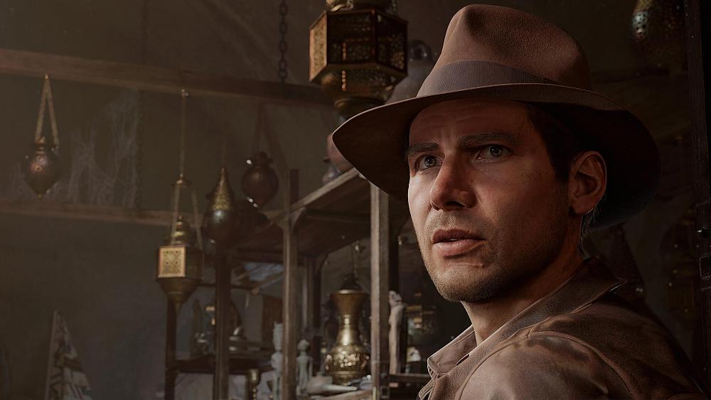 Indiana Jones looking back over his shoulder seemingly in a storage room of some sort.
